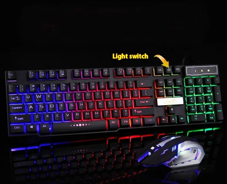 White and black gaming keyboard with glowing USB cable on a desktop