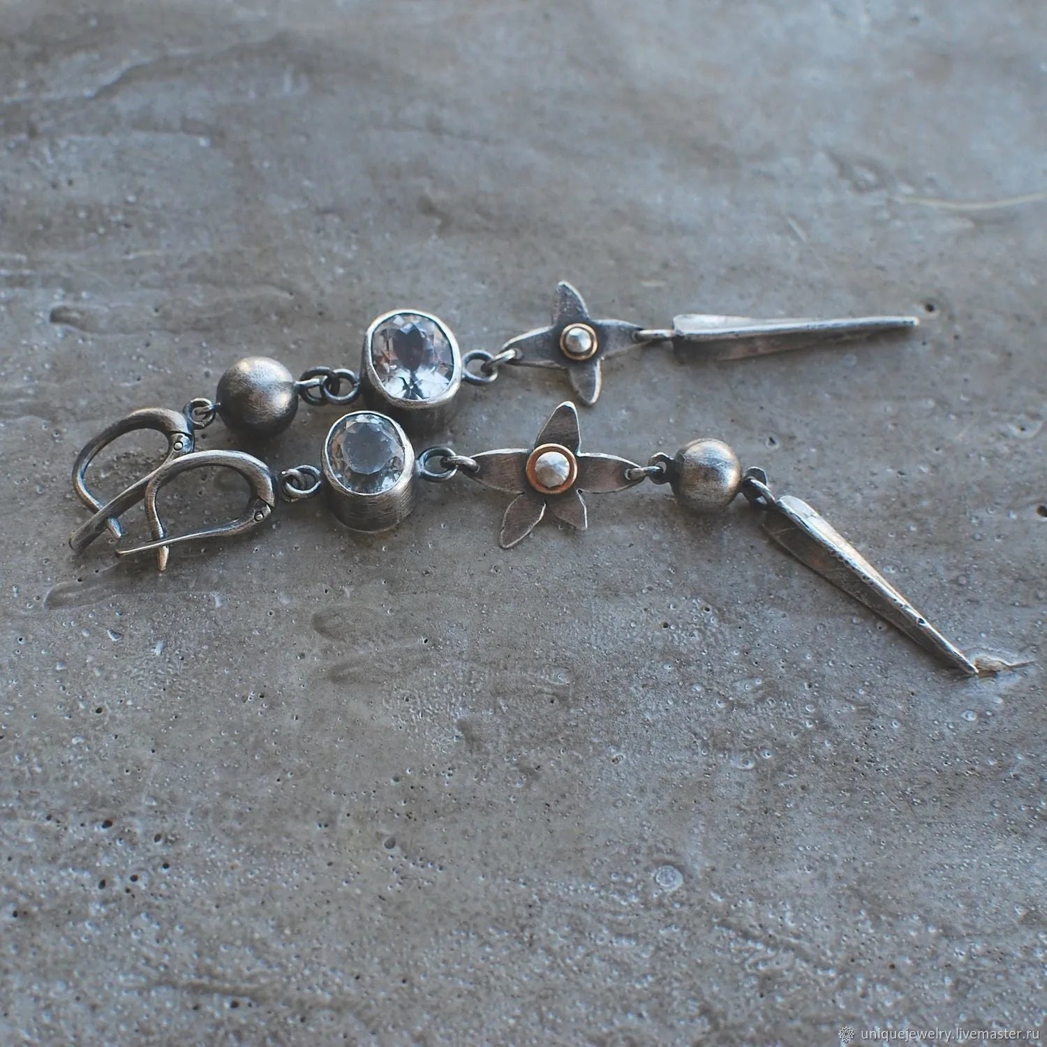 Hesheng geometric long pendant earrings with XINGX design and rhinestones in antique silver.