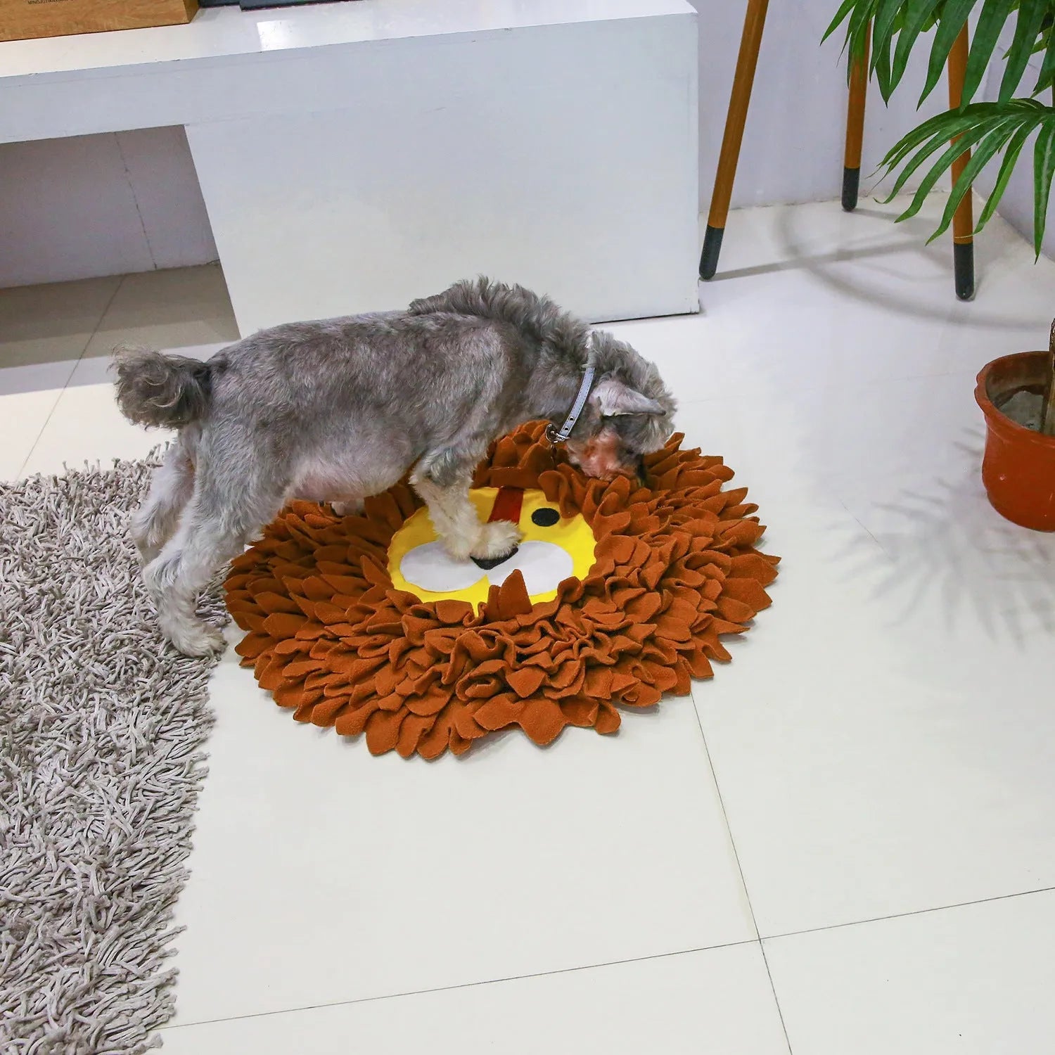 Brown pet snuffle mat with fabric folds for hiding treats, measuring 33cm by 25cm