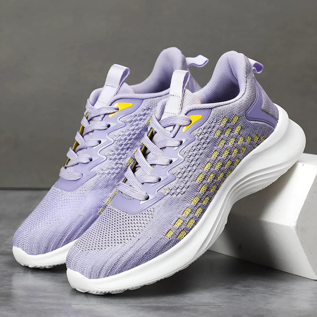 Women's lavender purple Flyknit running shoes with striped pattern and mesh design for sports