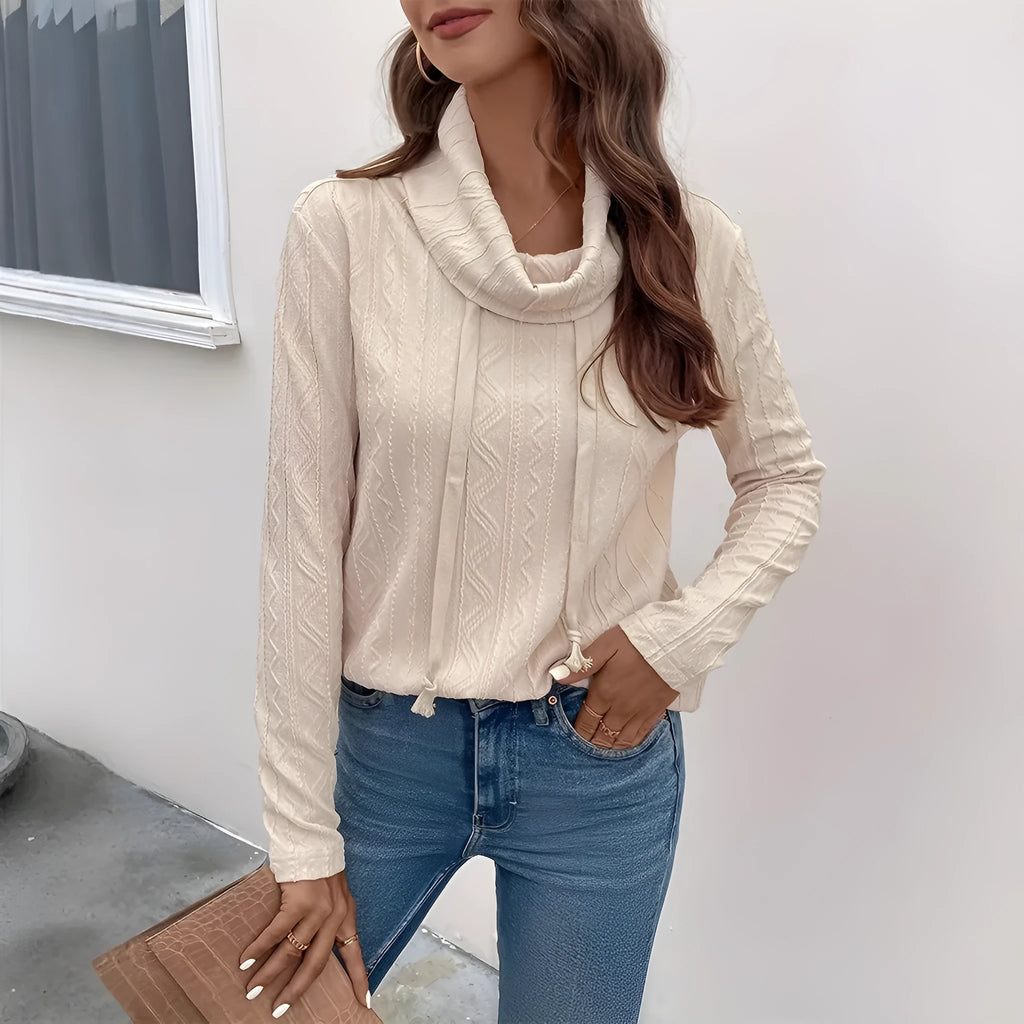 Apricot coloured long sleeve hooded pullover sweater with drawstring closure