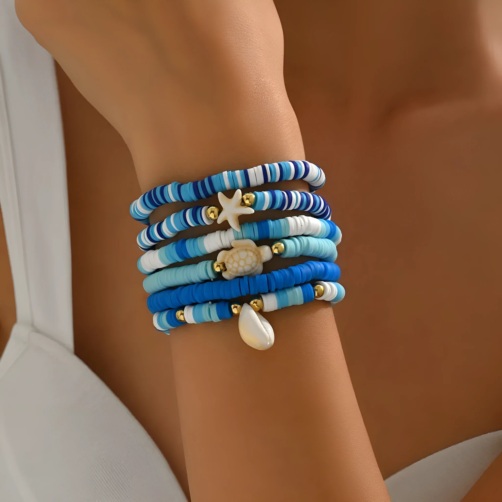 Bohemian blue polymer clay handmade shell bracelet suit with six geometric bracelets on display