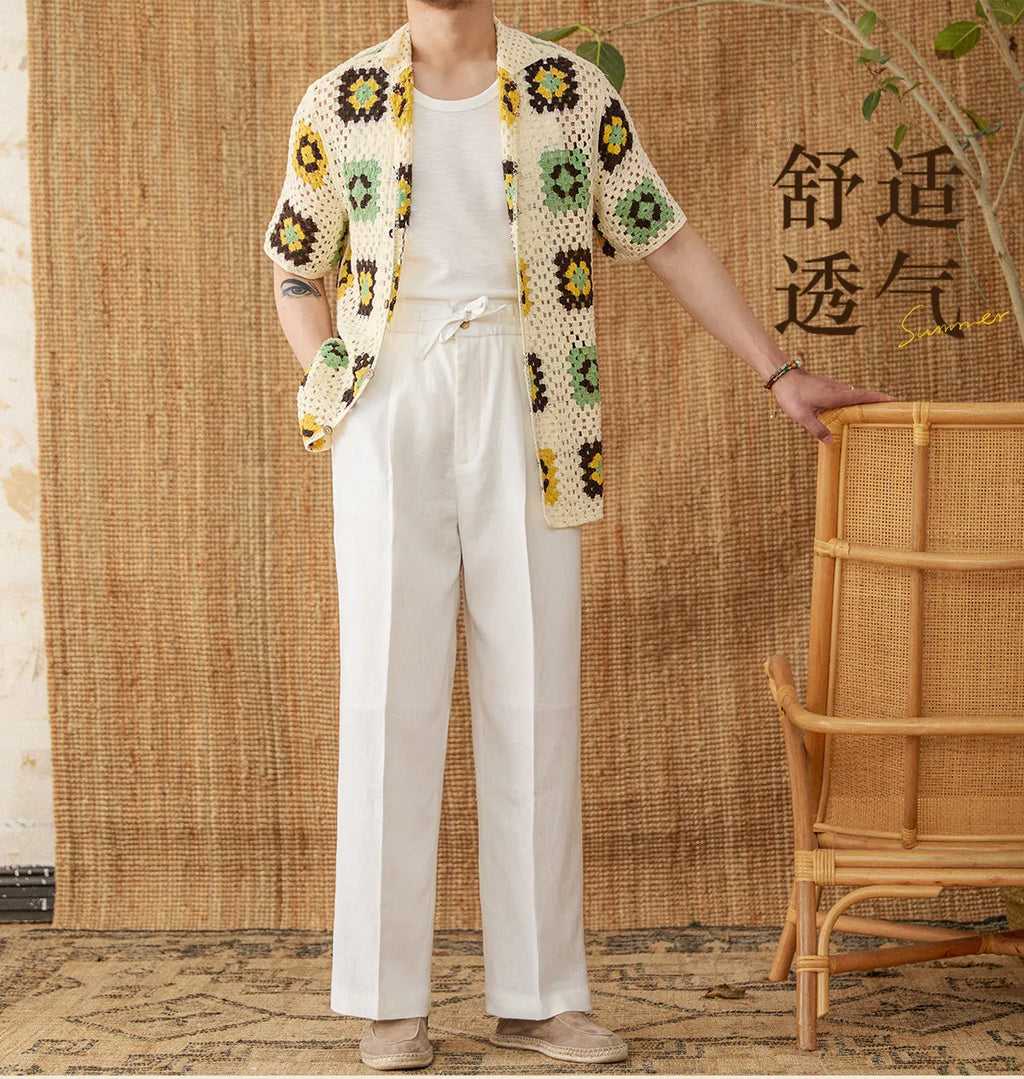 Straight-leg linen trousers with elasticated high waistband in navy blue, white, and greige colours