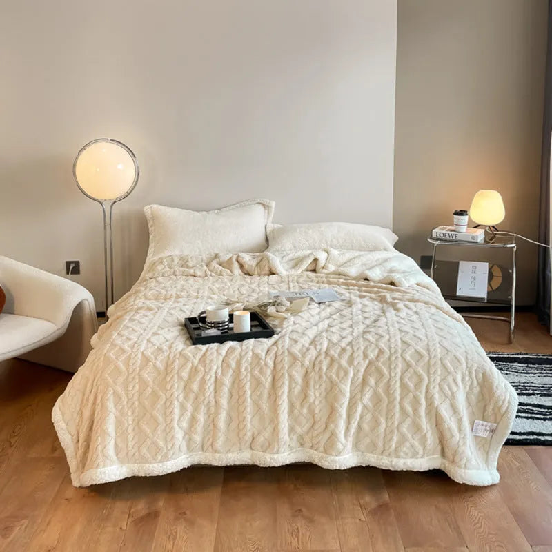 Polyester thermal flannel blanket in beige, folded to show texture and size.