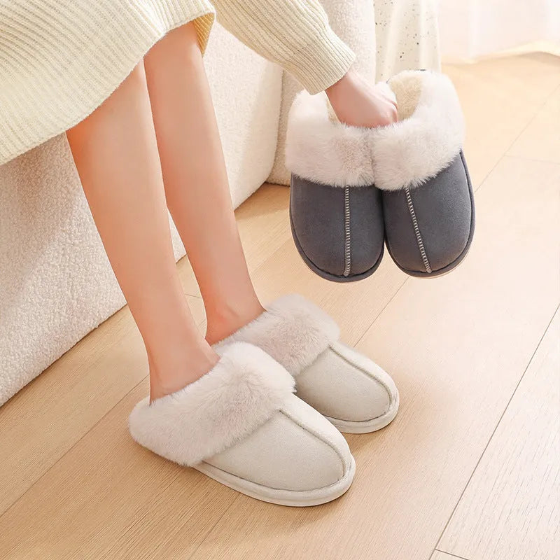 Brown women's plush indoor slippers with round toe, stitching detail, and flat non-slip sole.