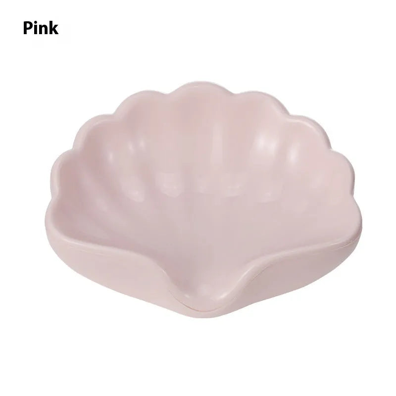 Plastic shell-shaped soap dish in pearl white colour with drainage design for bathroom use