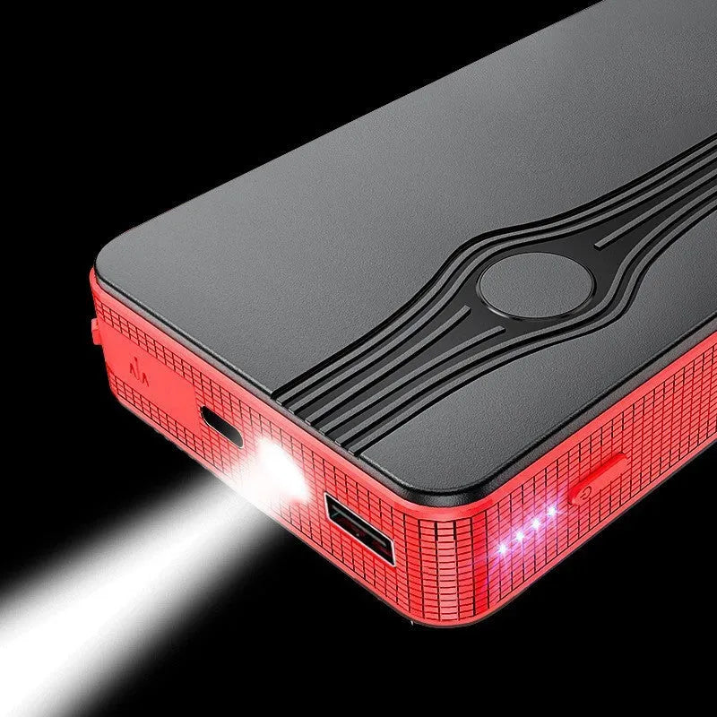 Red K4-E automobile emergency jump starter and power bank with data cable, compact rectangular design