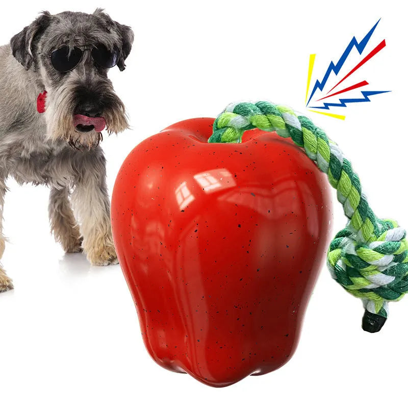 Green plastic dog food dropping ball molar toy with apple design for interactive feeding and chewing