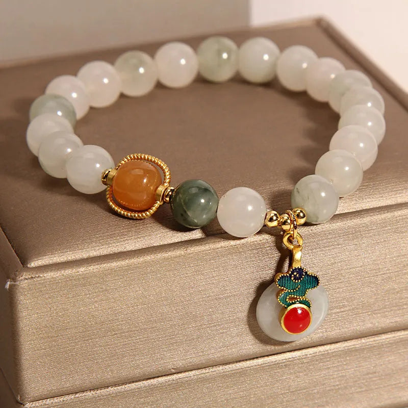 Ice jade women's bracelet with Xiangyun peace buckle and pearl decorative elements