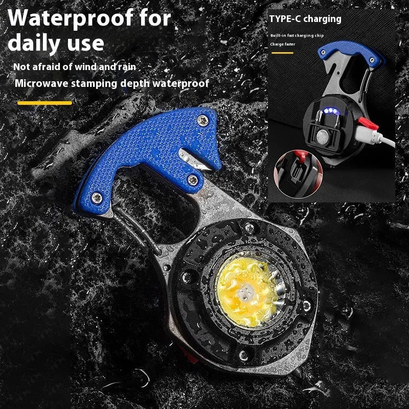 Compact silver and black multifunctional keychain flashlight with keyring, display screen, and integrated window breaker tool.