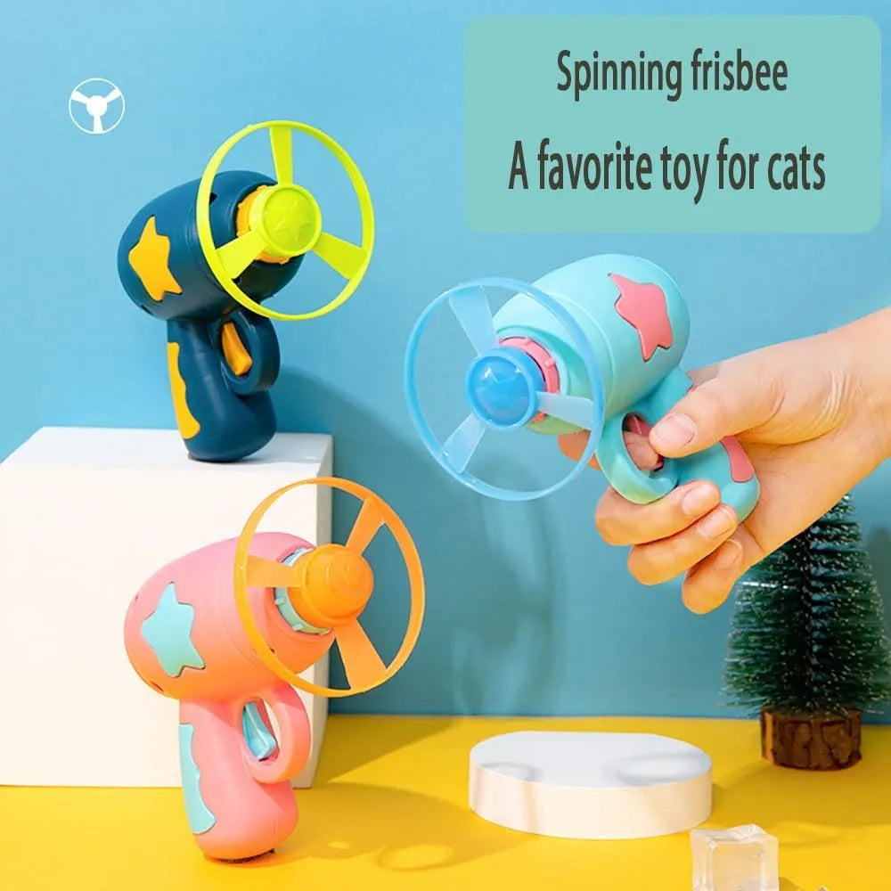 Blue and pink plastic cat toy gun with two frisbees for indoor play