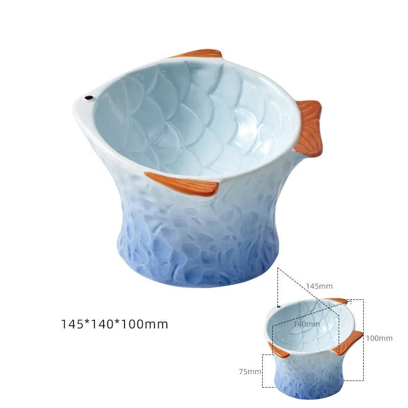 Blue fish-shaped ceramic cat bowl with 15-degree tilt angle and elevated design