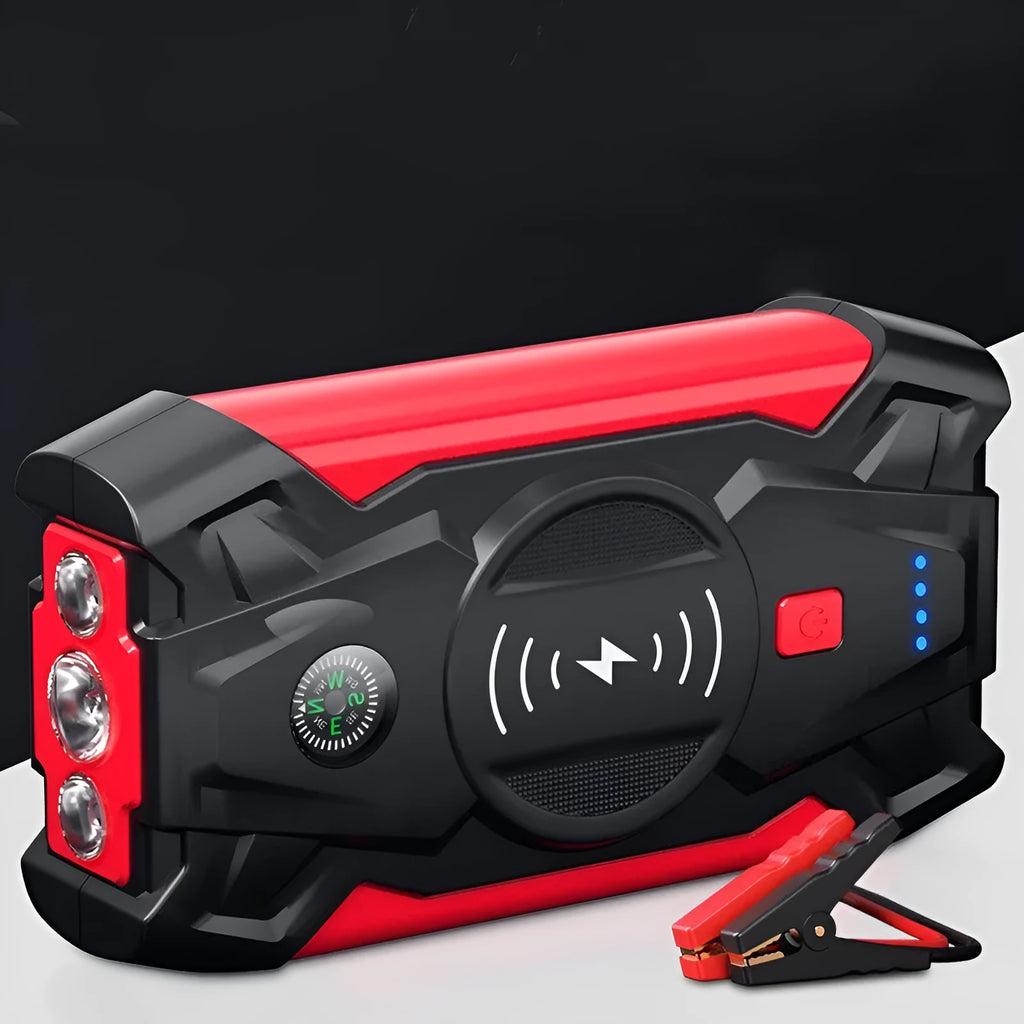 Red car emergency jump starter power pack showing digital display and battery clips
