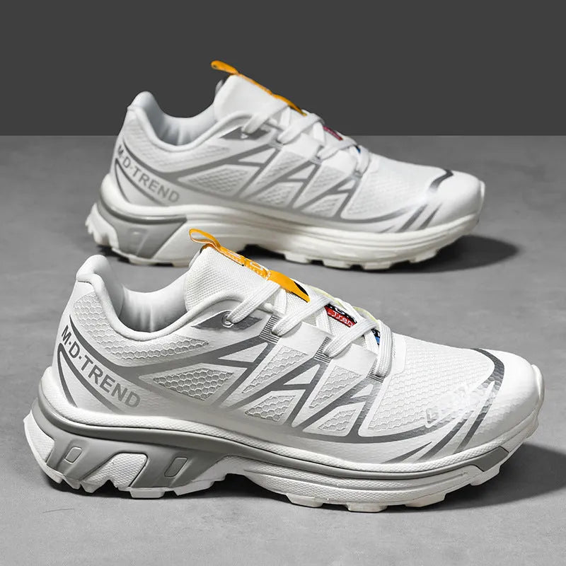 Men's and women's low top hiking shoes with artificial leather upper and rubber sole in black silver and khaki colors for outdoor tourism