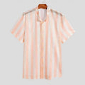 Pink men's loose-fit waffle texture short sleeve cardigan shirt on a hanger.