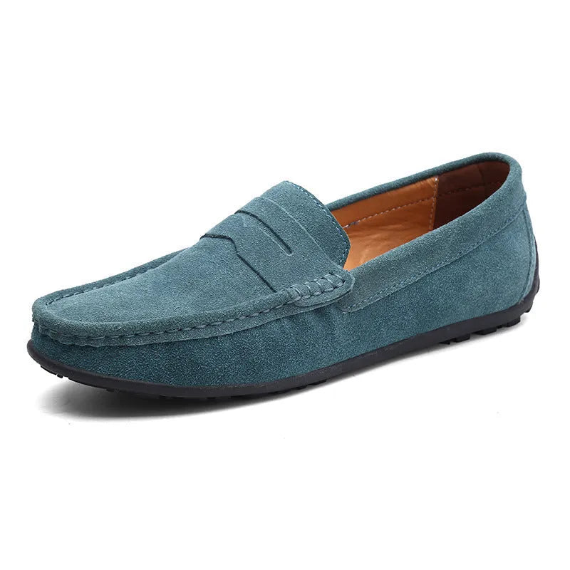 Men's brown suede casual loafers with a round toe and flat rubber sole on a white background.