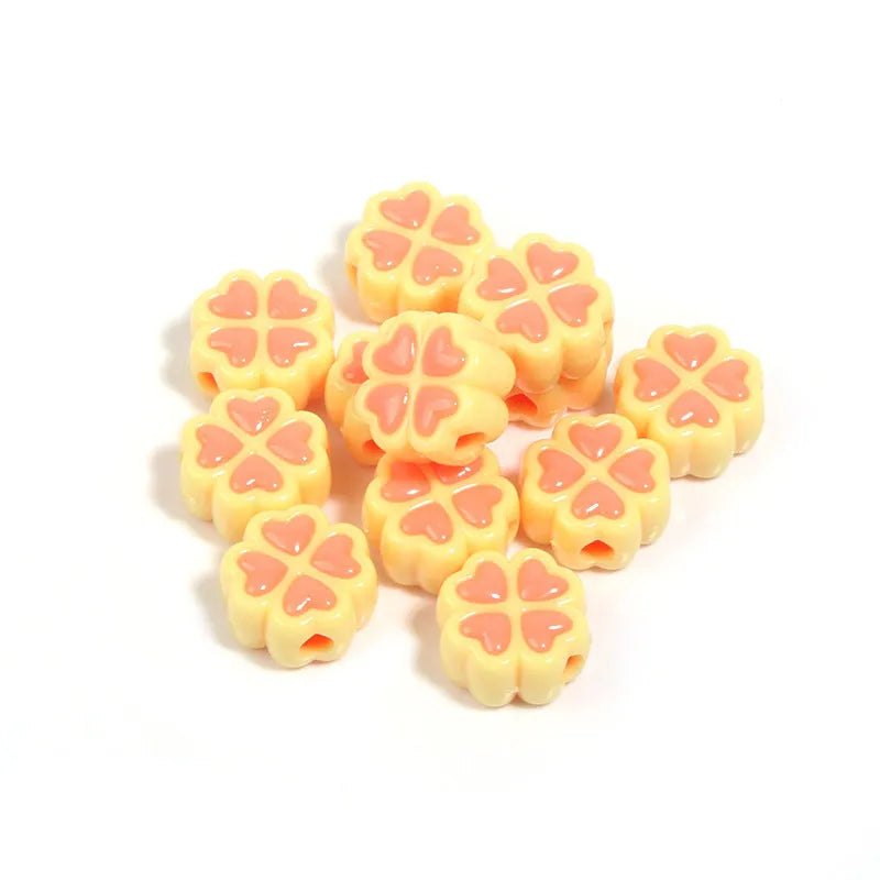 15mm acrylic craft beads with four-leaf clover shape and frosted finish in multiple colours