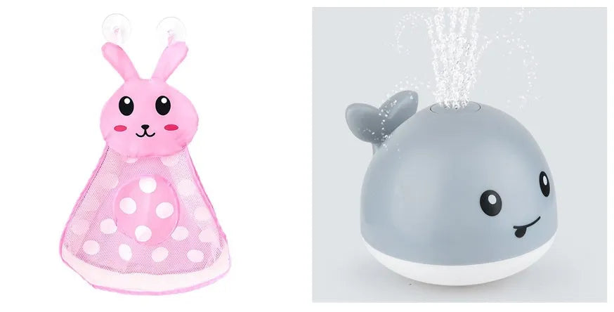 Whale-shaped electric bath toy spraying water with flashing lights, on a blue base.
