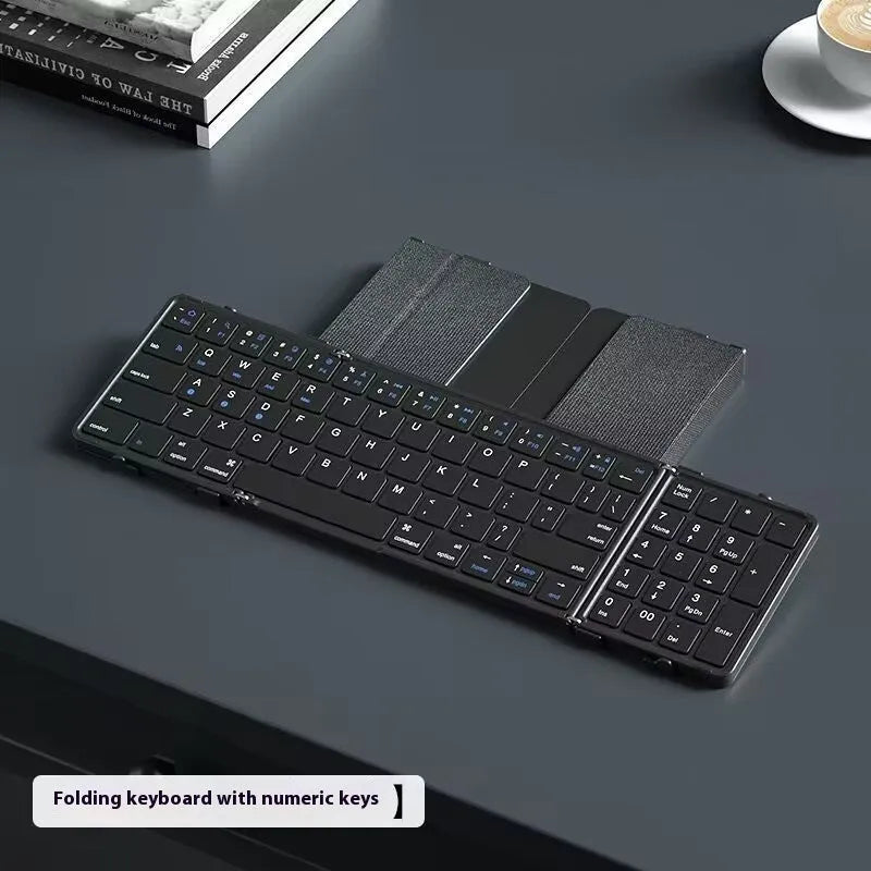 Black folding Bluetooth keyboard for mobile devices with compact dimensions