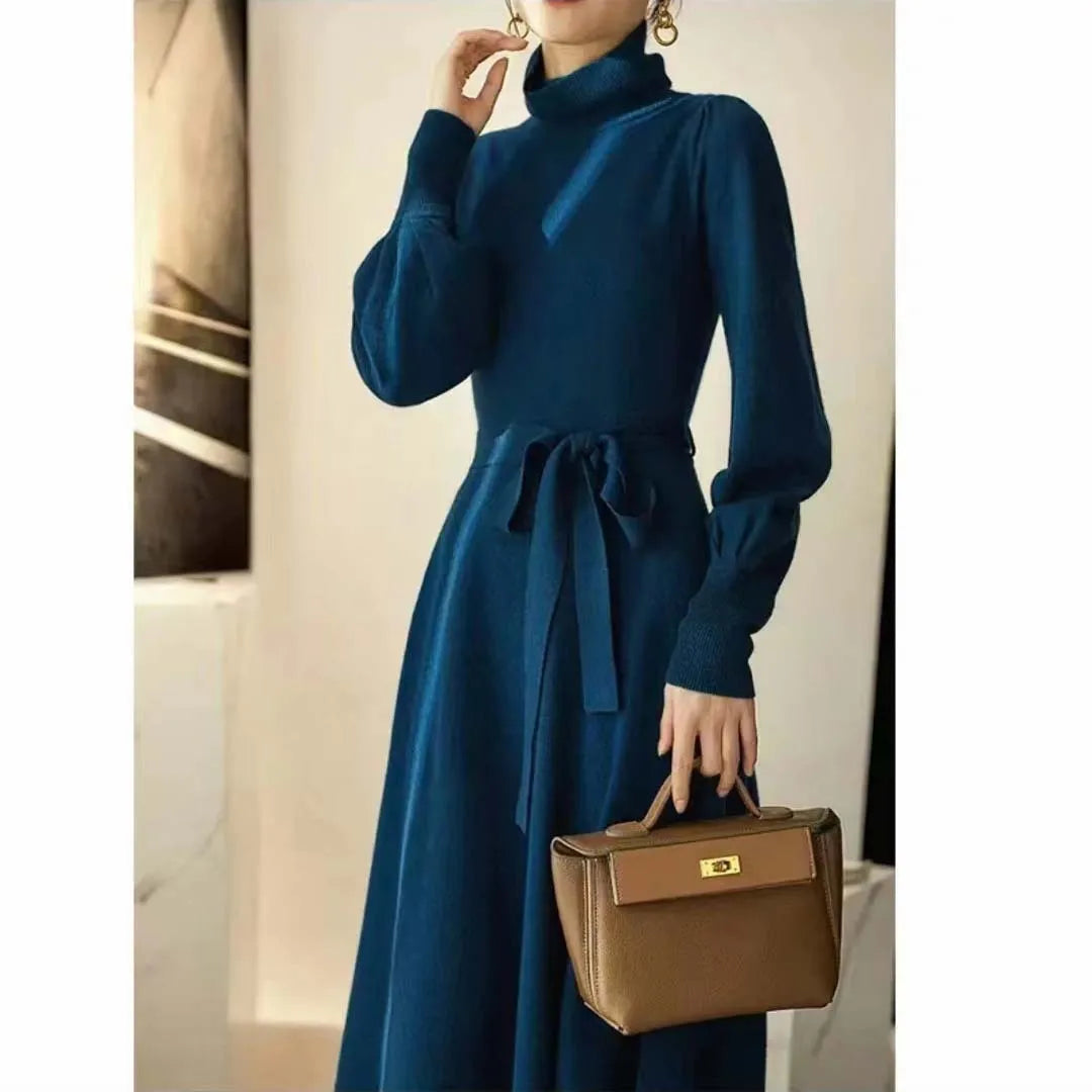 Women's turtleneck long sleeve knit dress in loose fit with big hem and elastic waist.
