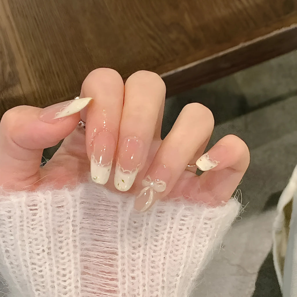 False nails for girls showing short square and coffin shapes in various solid and sparkle colours