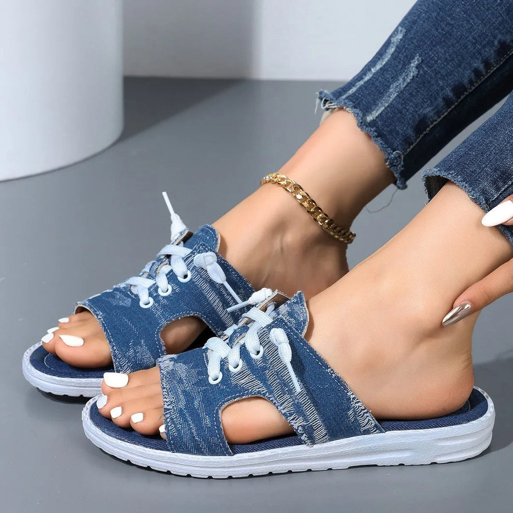 Blue Roman style women's canvas slippers with flat design and rubber sole