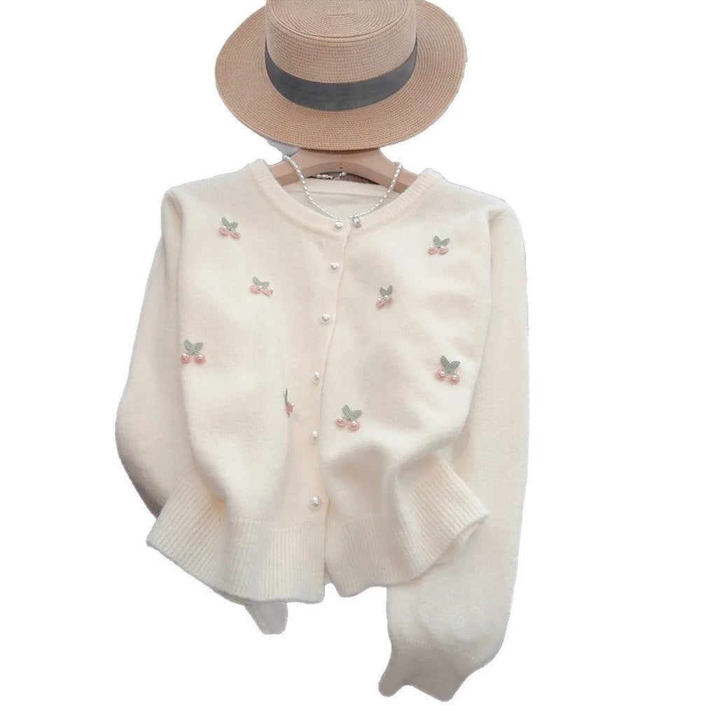 Pink nylon cashmere slim fit cardigan coat with beaded details and a round neck.