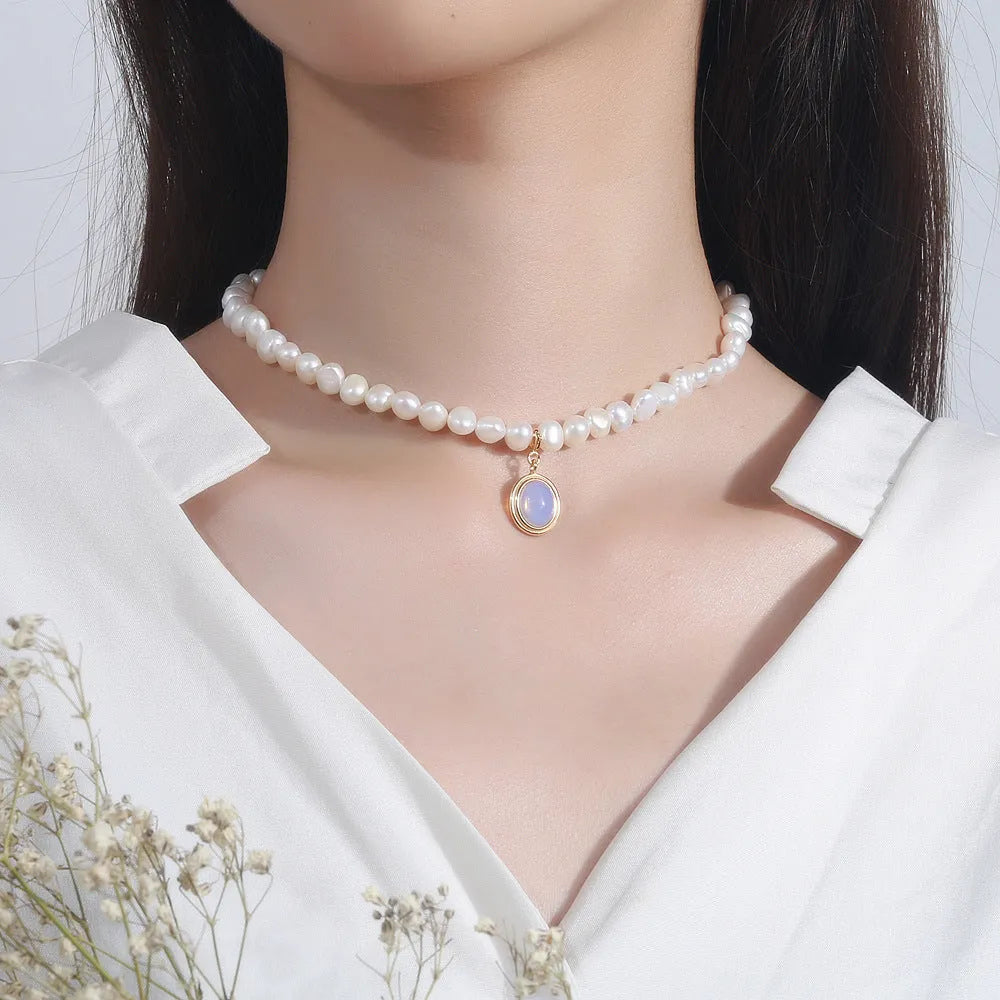 Geometric silver pendant necklace with irregular freshwater pearls on adjustable chain