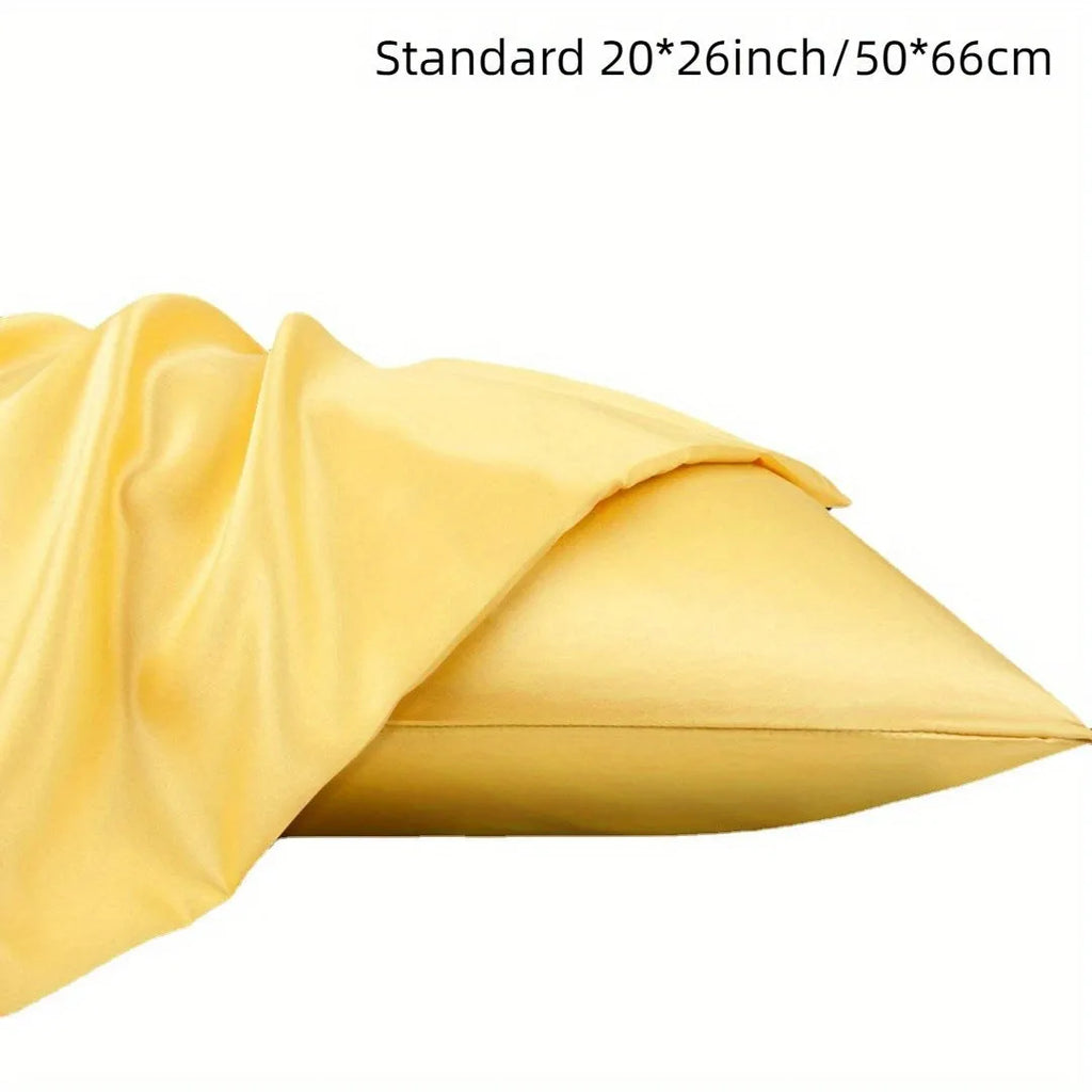 Pair of solid colour satin cloth pillowcases in polyester fibre available in twelve colours and four sizes