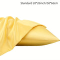 Pair of solid colour satin cloth pillowcases in polyester fibre available in twelve colours and four sizes