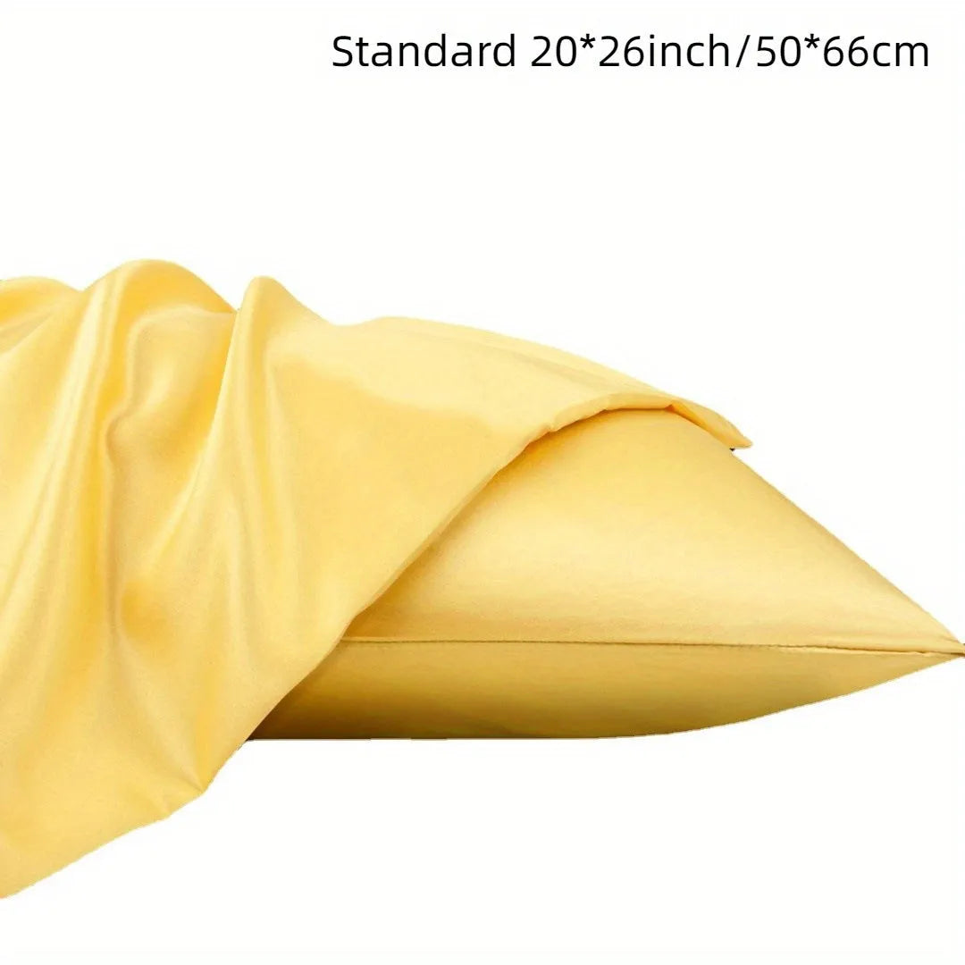 Pair of solid colour satin cloth pillowcases in polyester fibre available in twelve colours and four sizes