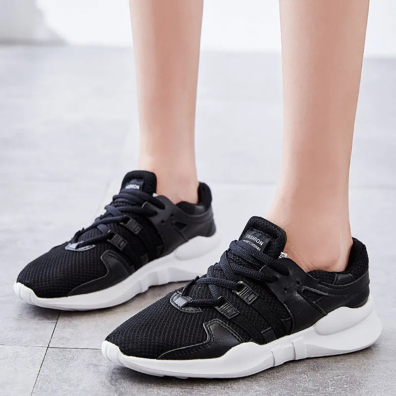 Casual low-top sneaker with mesh upper and hollow breathable design for summer wear