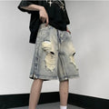 Blue denim shorts with wide leg cut and tattered retro detailing