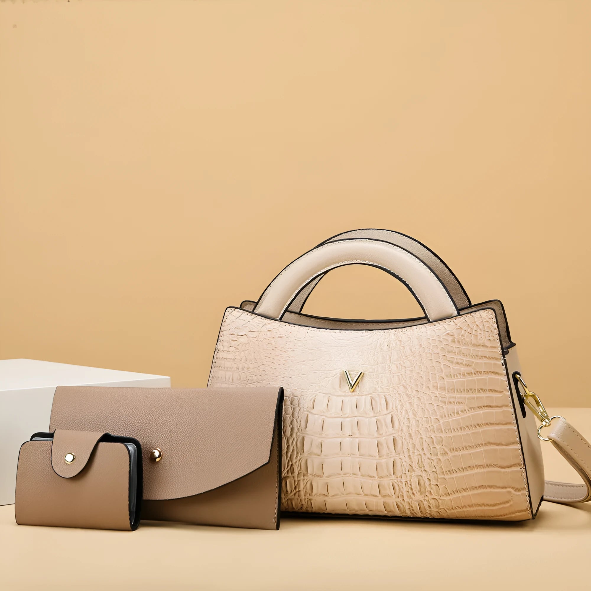Square vertical women's crossbody handbag in crocodile-print PU leather, showing internal organiser pockets.