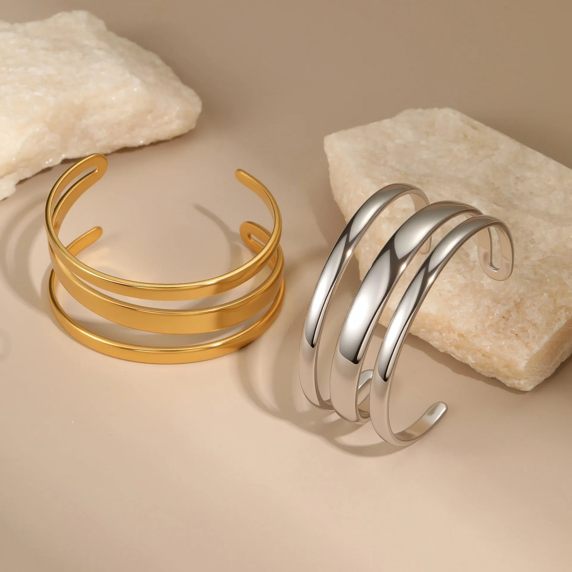 Stainless steel geometric opening bracelet with 18K electroplating in gold or steel colour