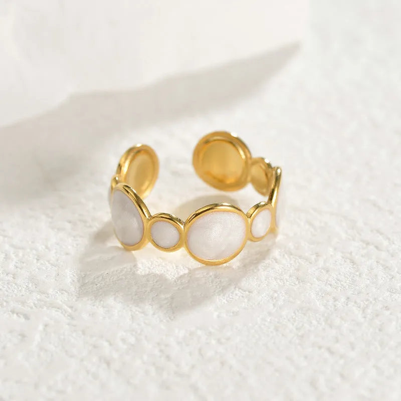 Adjustable opening geometric ring for women in stainless steel with electroplated finish
