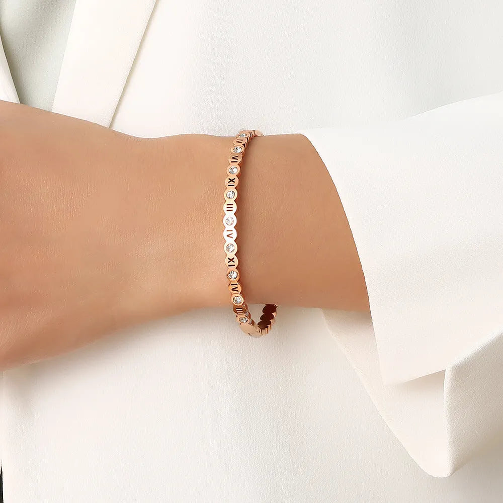 Korean style titanium steel bracelet with number elements in gold rose gold or steel colour