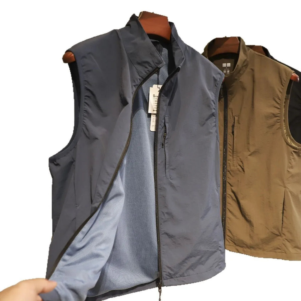 Men's straight cut nylon vest in army green with side seam pockets.