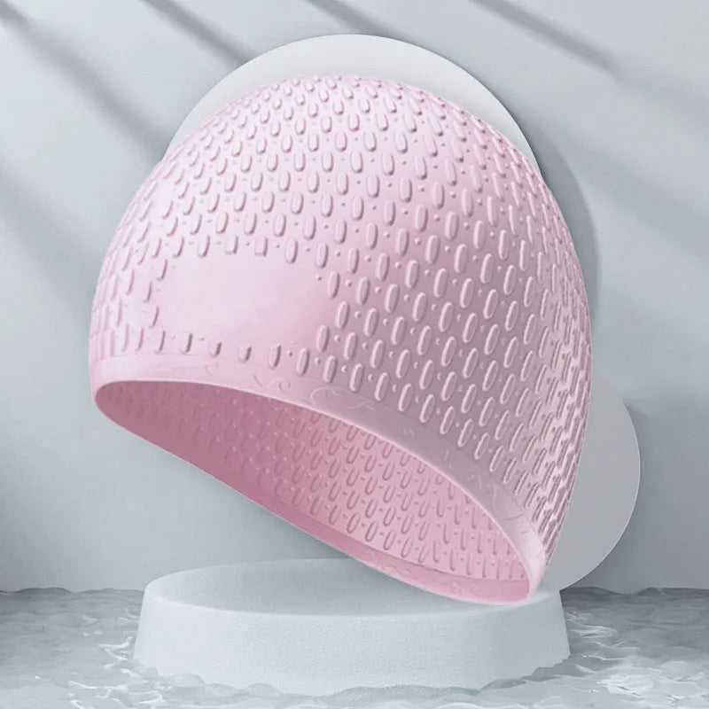 Silicone adult swimming cap with water drop texture in solid colour options on white background.
