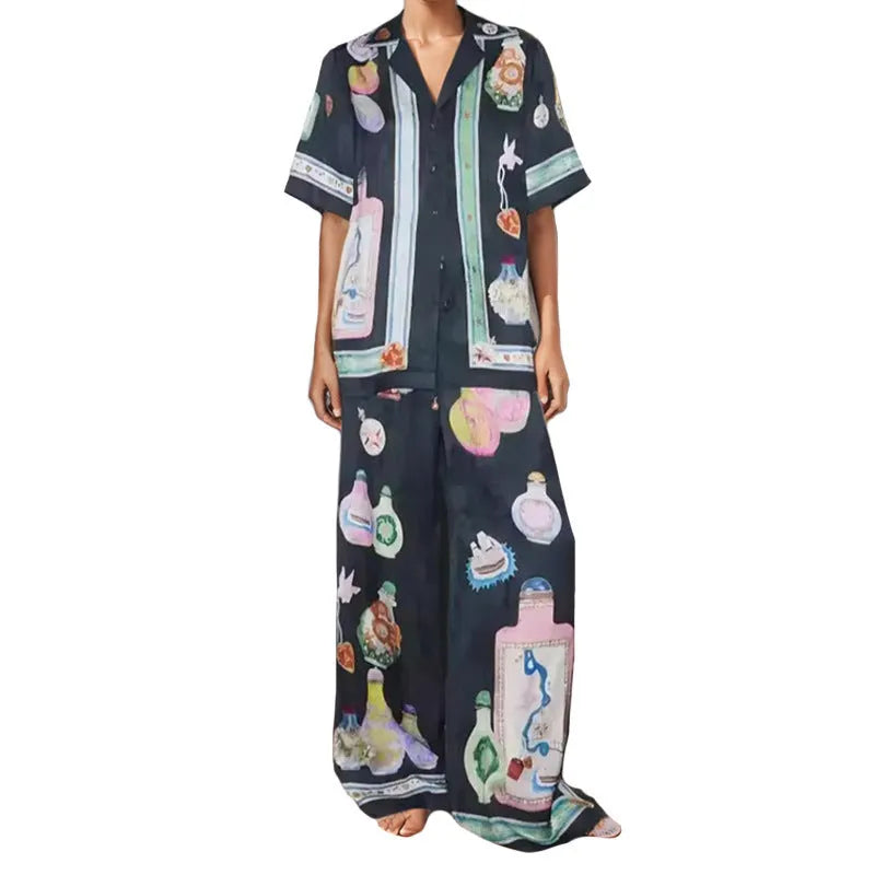 Black women's cartoon print casual set with cardigan and matching trousers