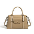Genuine leather street trend ladies handbag with single shoulder strap in black, brown, or elephant grey.