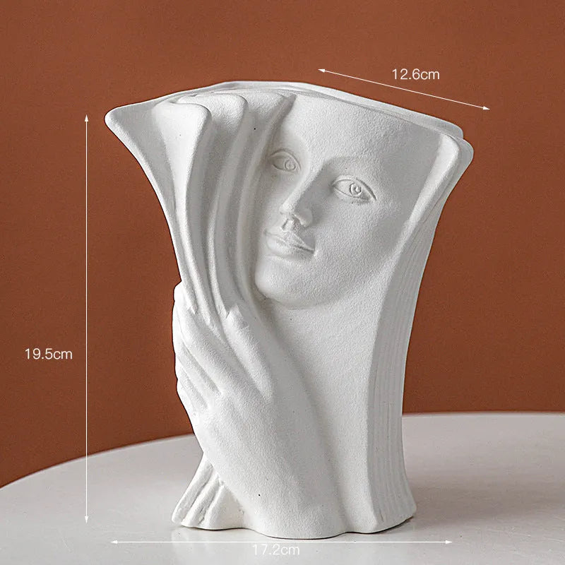 Glazed ceramic book stand in a modern design, showing one of four colour options.