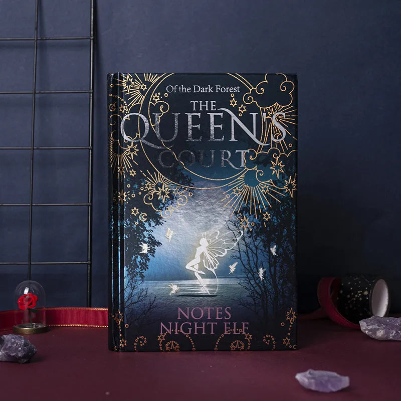 Blue A5 luminous hardcover notebook open to show full-colour illustrated pages
