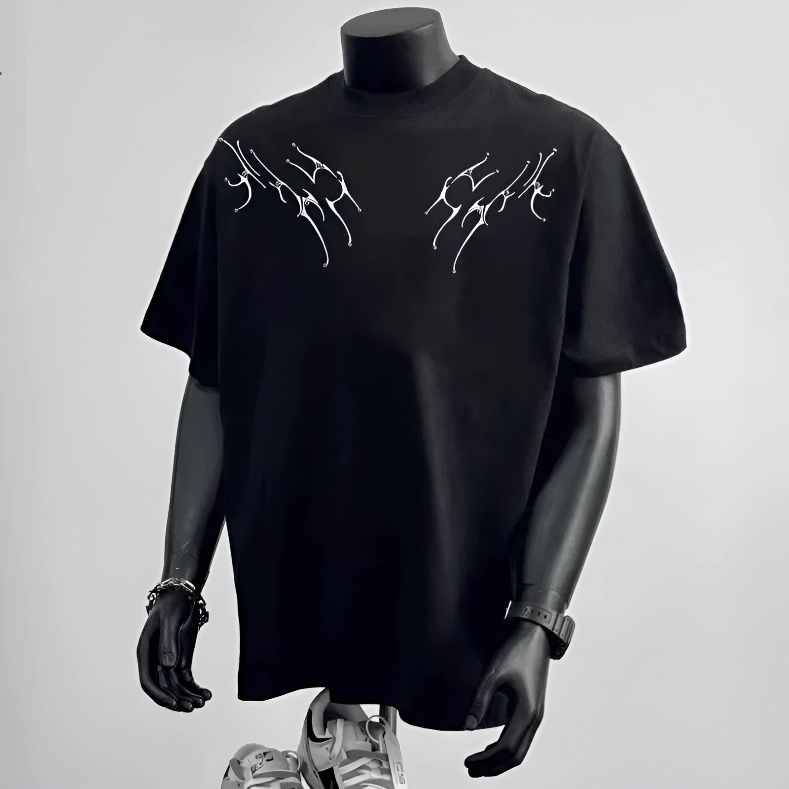 Men's loose fit black printed cotton short sleeve t-shirt on hanger