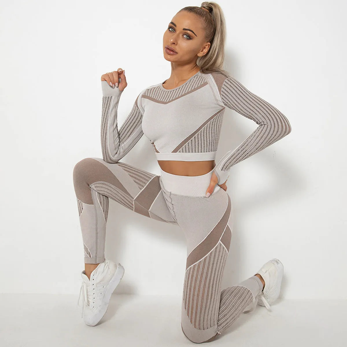 Women's long-sleeved seamless knitted yoga wearsuit in a black stripe pattern