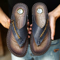 Men's dark blue herringbone pattern outdoor slippers with rubber sole and leather lining.
