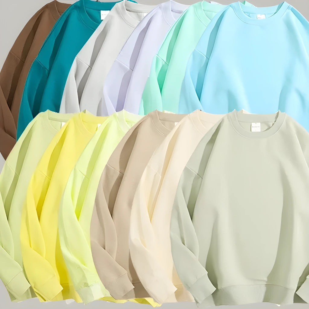 Women's loose fit cotton off shoulder sweater in a solid colour on a hanger.