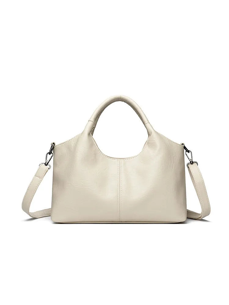 Genuine leather women's cross-body bag in available colours with adjustable shoulder strap