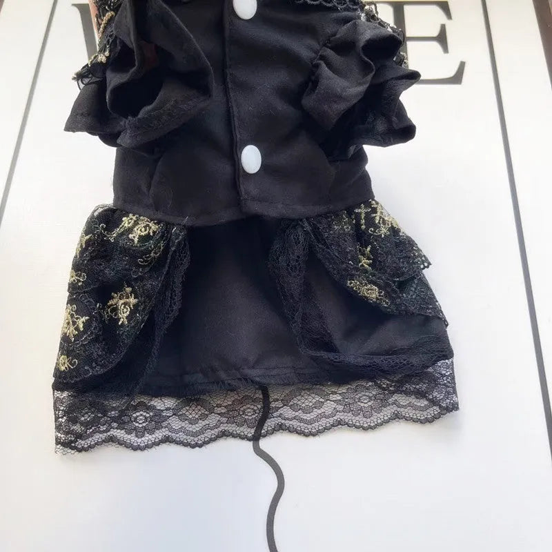 Gold Gothic princess style dress for a small dog or cat on a mannequin.