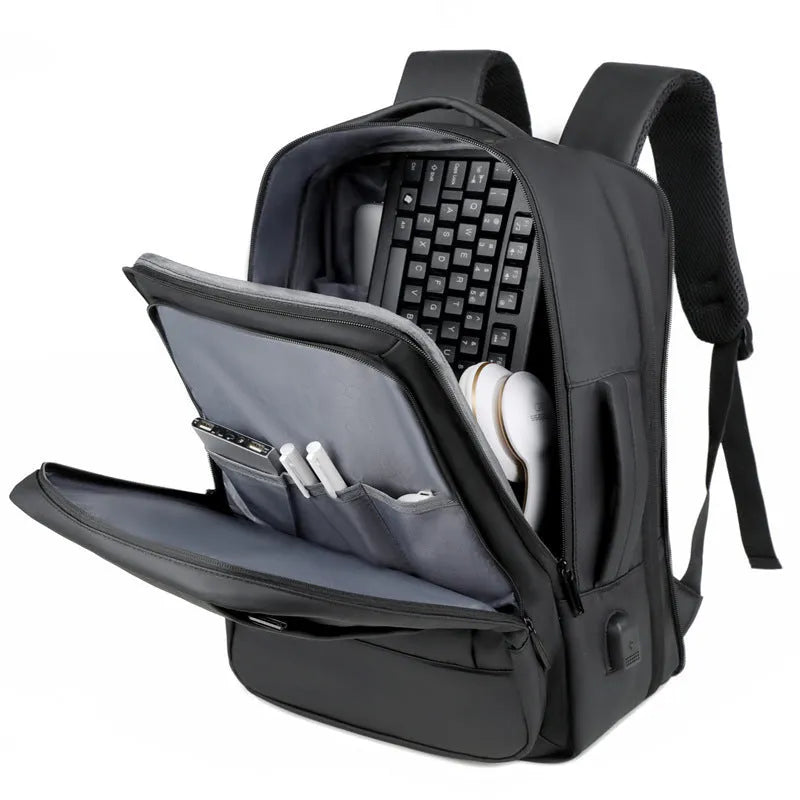 Large black business backpack with curved shoulder strap and waterproof Oxford cloth construction